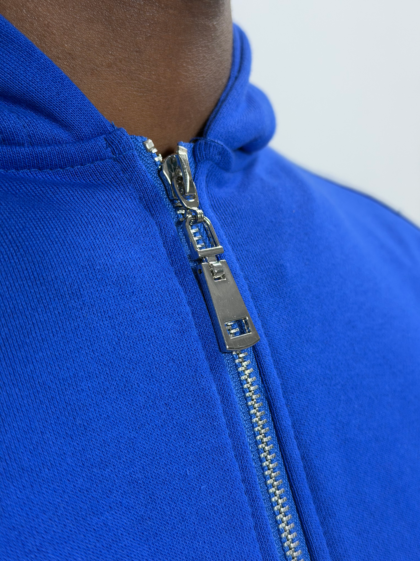 BLUE REFLECTIVE ZIP UP